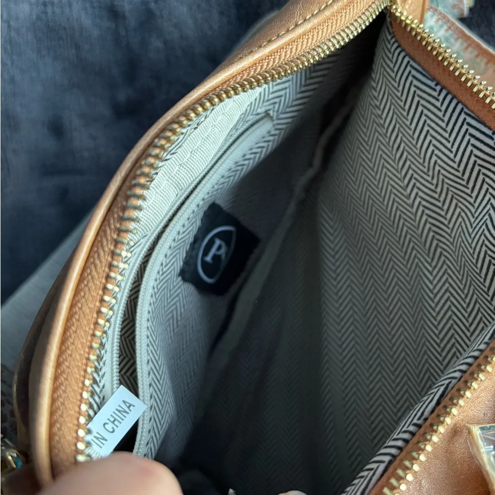 Brown Vegan Leather Sling‎ Bag with floral strap.